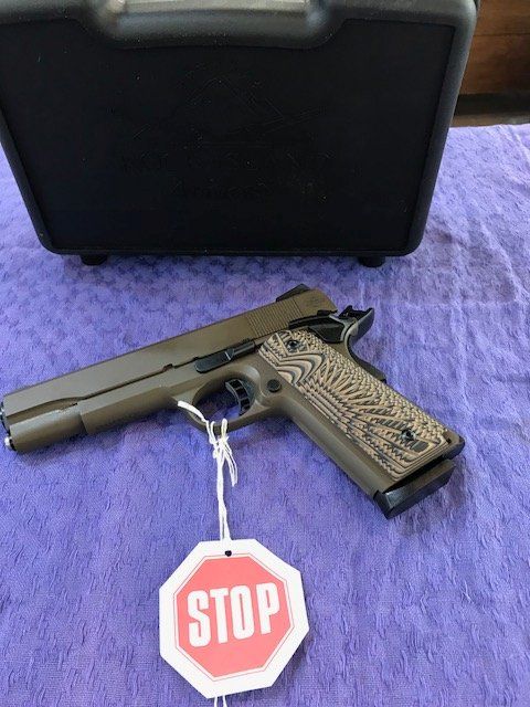 Rock Island 1911 .45acp with G10 grips and cerakote