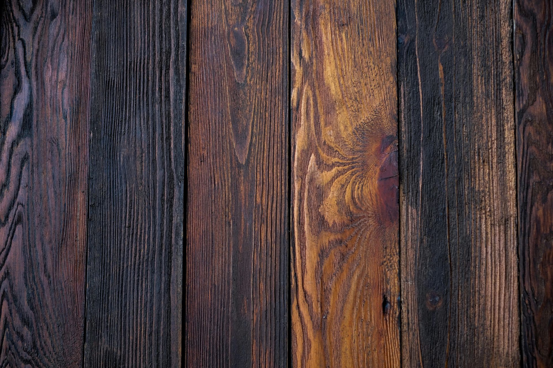 Hardwood flooring showing varied wood grain and multi-toned finish