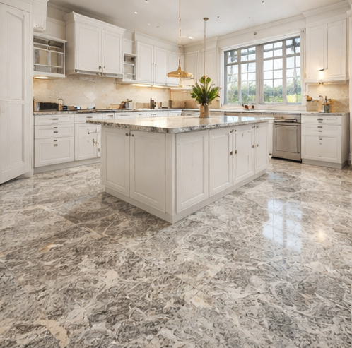 White kitchen with marble floors and island, cabinets, and appliances.