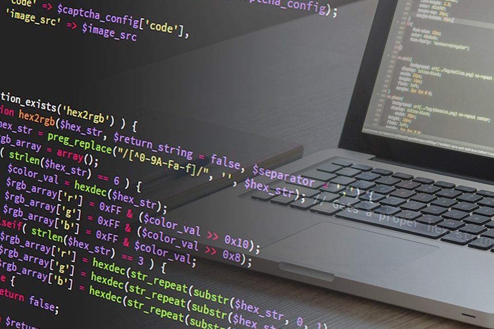 A laptop with a lot of code on it