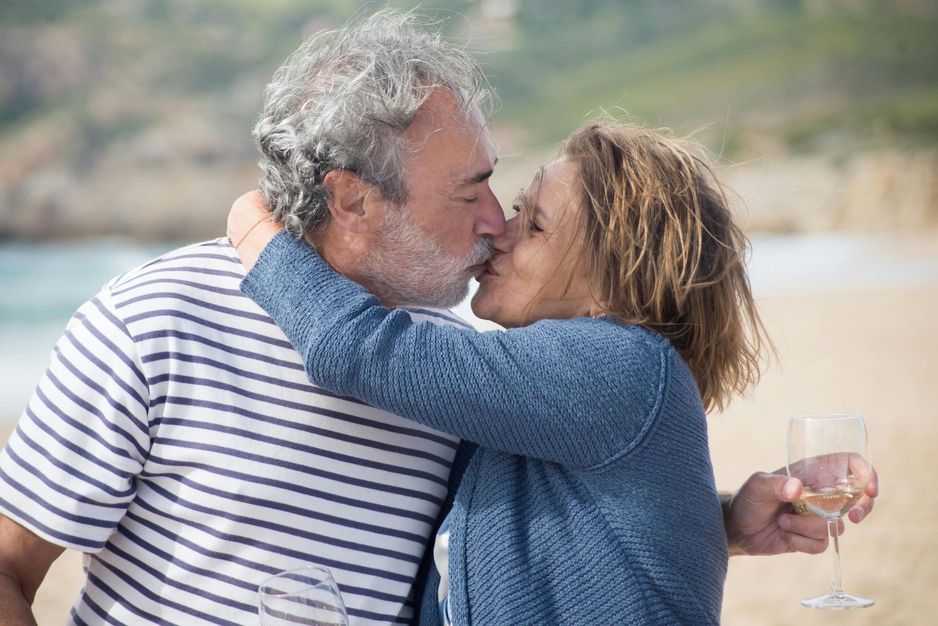 Retired couple embracing