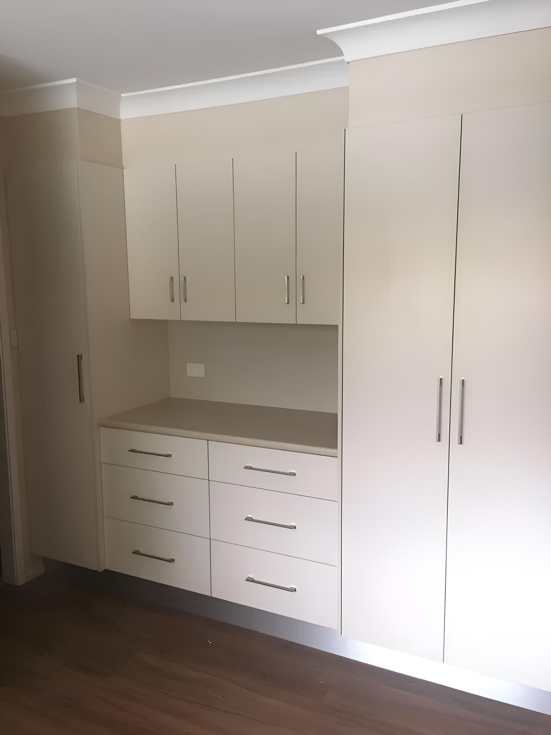 A Room With A Lot Of White Cabinets And Drawers — Hey Presto Kitchens & Renovations in Armidale, NSW