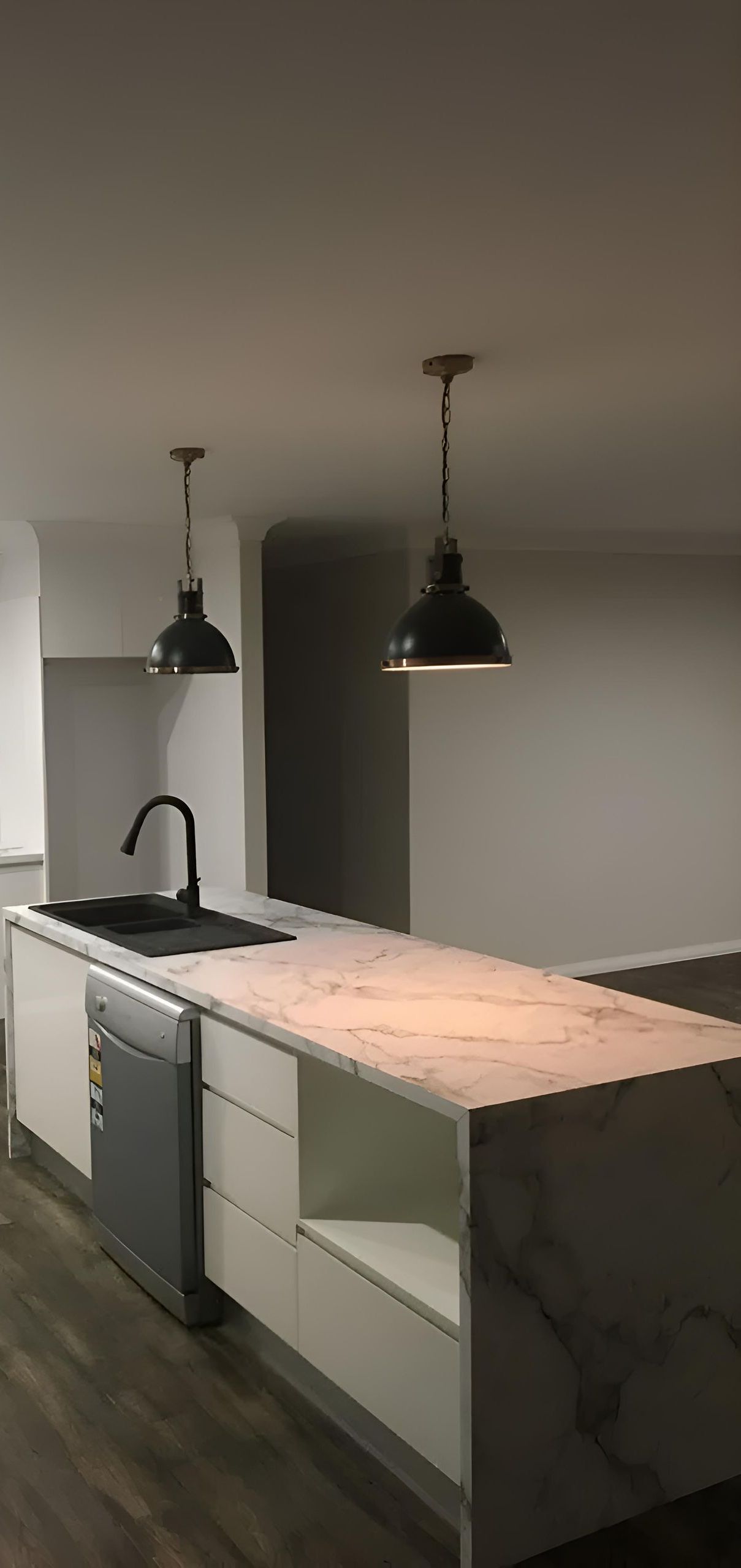 A Kitchen With a Marble Counter Top, a Sink, and a Dishwasher — Hey Presto Kitchens & Renovations in Armidale, NSW