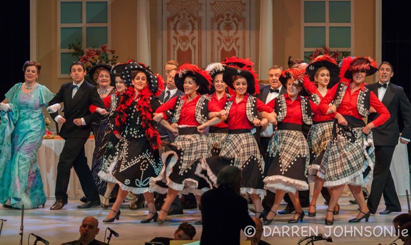 A group of people are dancing on a stage.