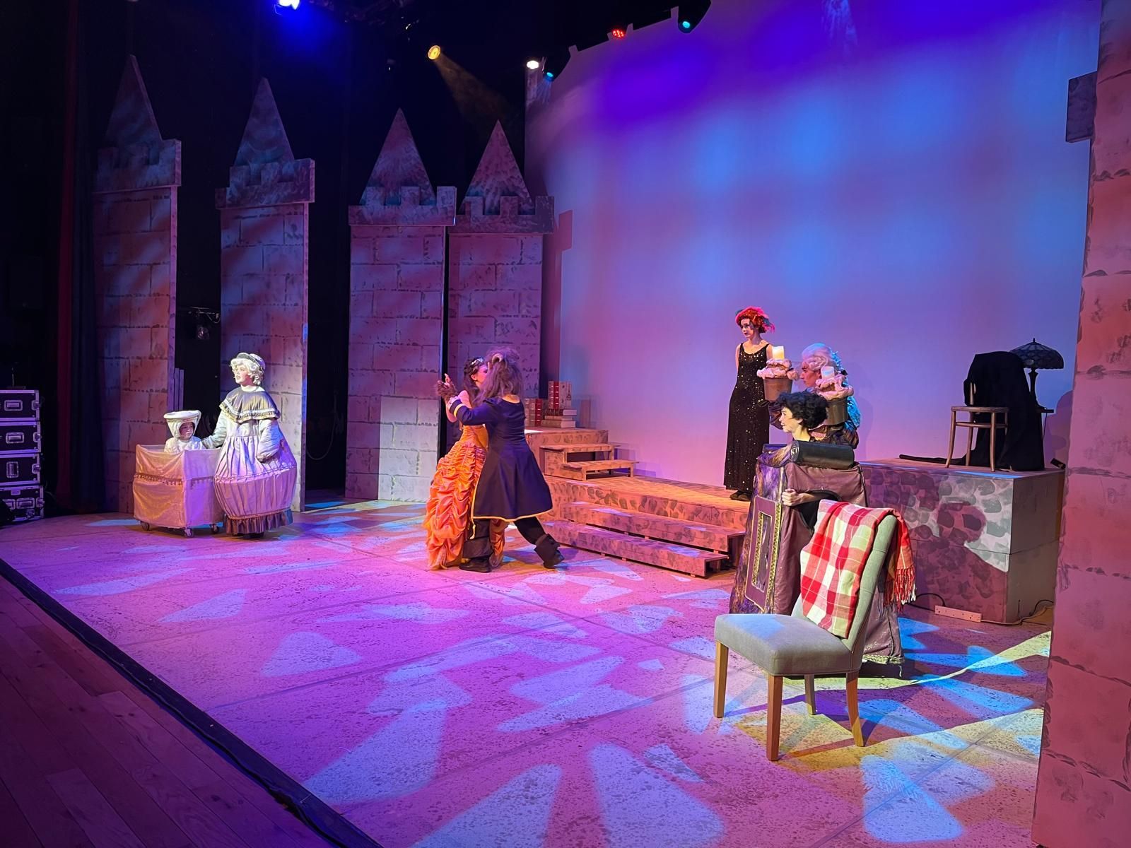 A man is giving a presentation to a group of people in a room.