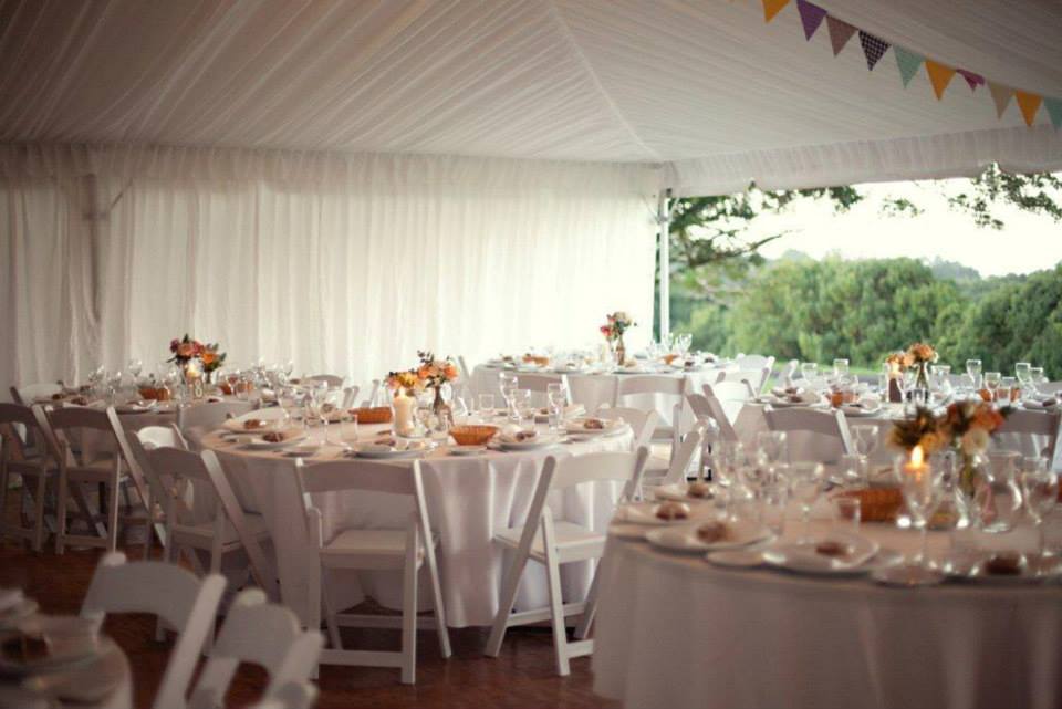 White Wedding Table And Chairs Setup With Candles — Wedding & Event Hire In Goonellabah, NSW