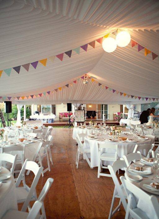 Tables And Chairs Setup With Little Flags — Wedding & Event Hire In Goonellabah, NSW