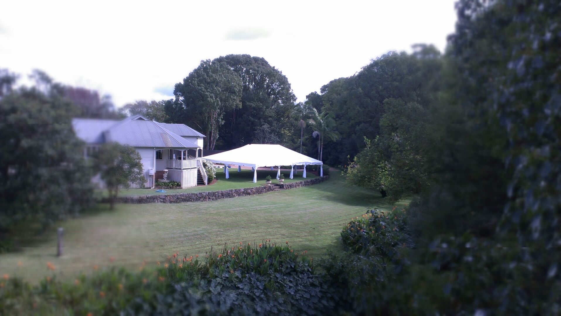 White Marquee Beside A Big House — Wedding & Event Hire In Goonellabah, NSW