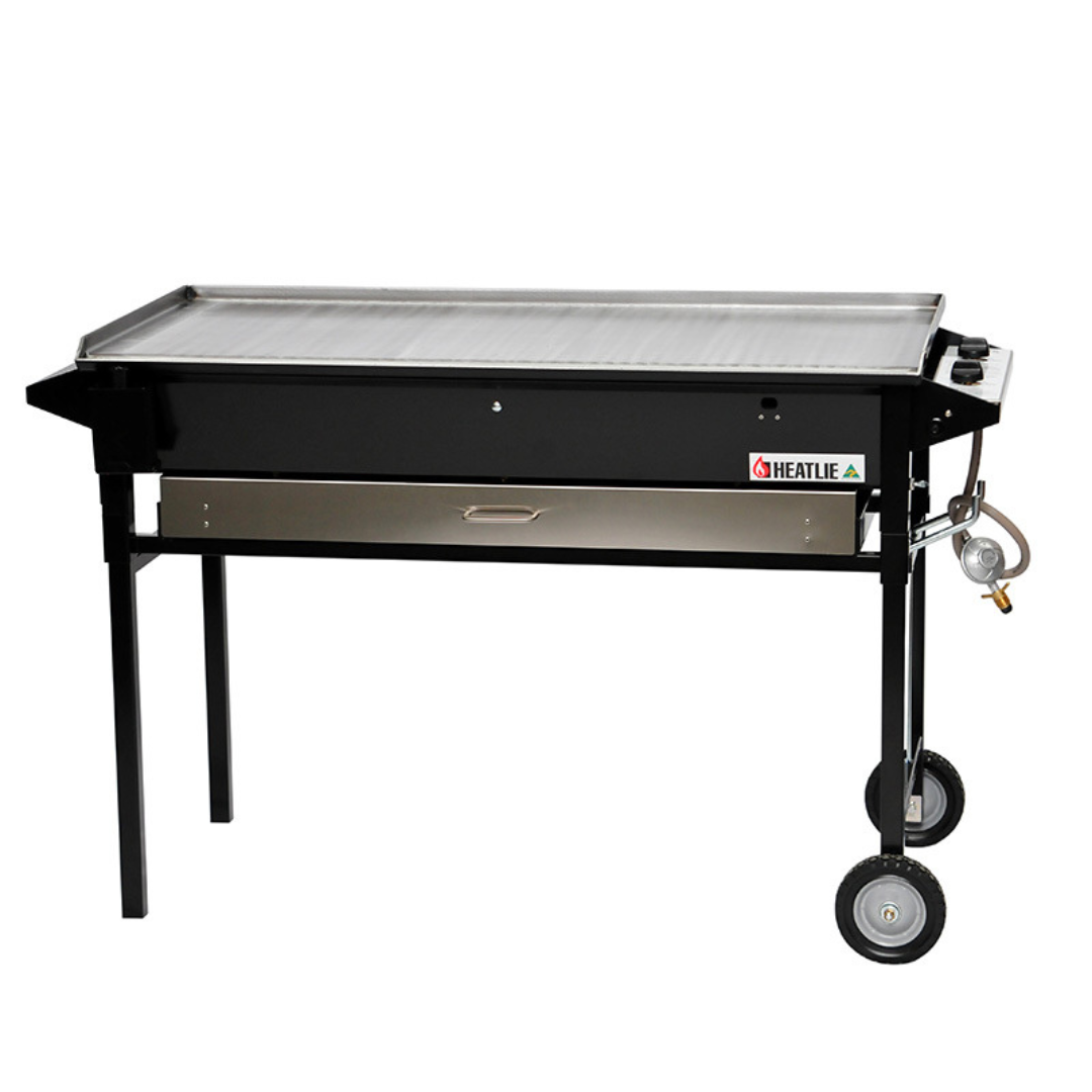 A Portable Grill With Wheels On A White Background — Wedding & Event Hire In Goonellabah, NSW