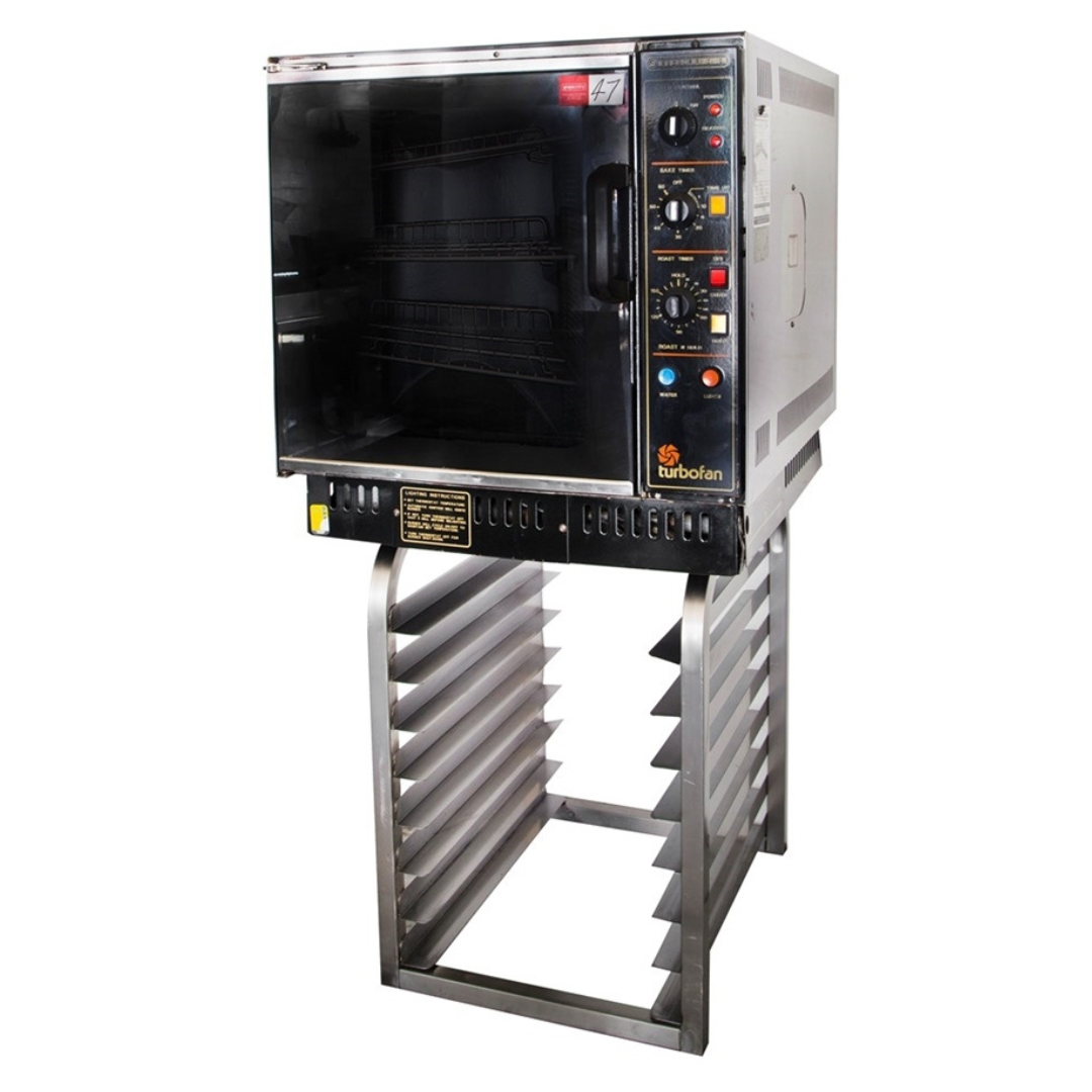 A Stainless Steel Oven Is Sitting On Top Of A Stainless Steel Rack — Wedding & Event Hire In Goonellabah, NSW