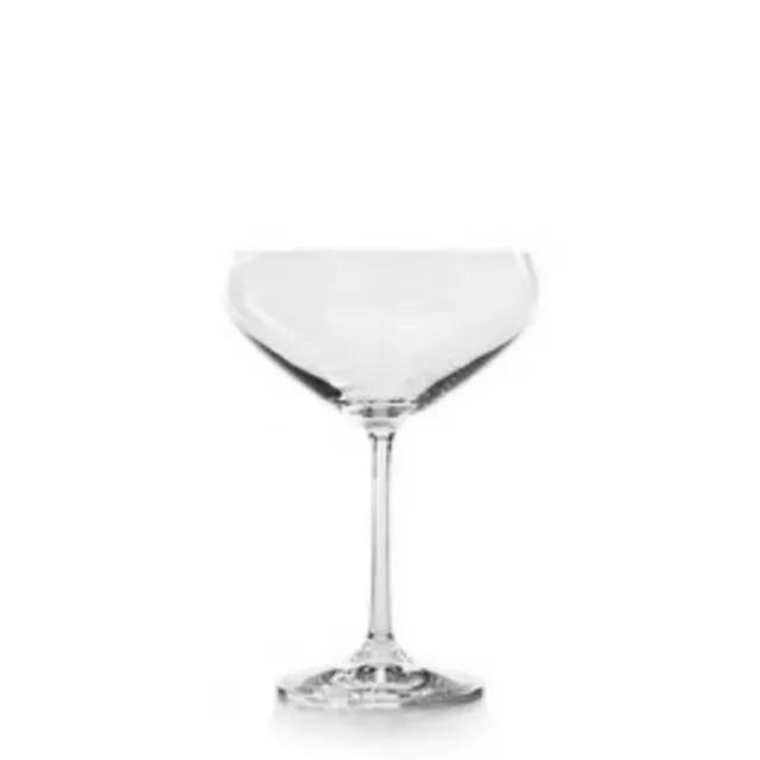 A Clear Wine Glass Is Sitting On A White Surface — Wedding & Event Hire In Goonellabah, NSW
