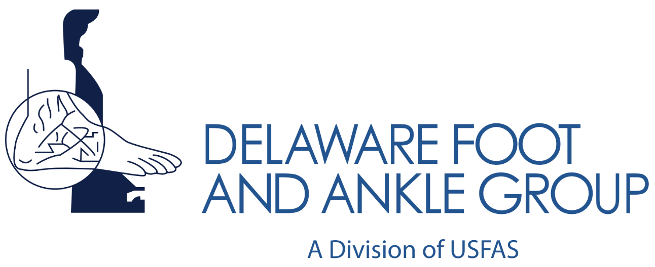 The logo for usfas foot and ankle specialists is blue and gray.