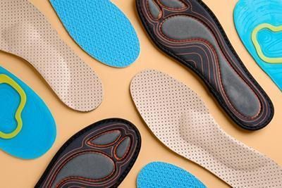 There are many different types of insoles on the table.