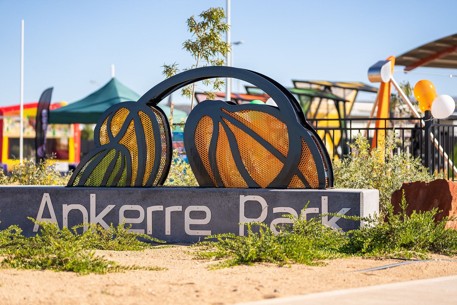 A sign for ankerre park with a basketball on it