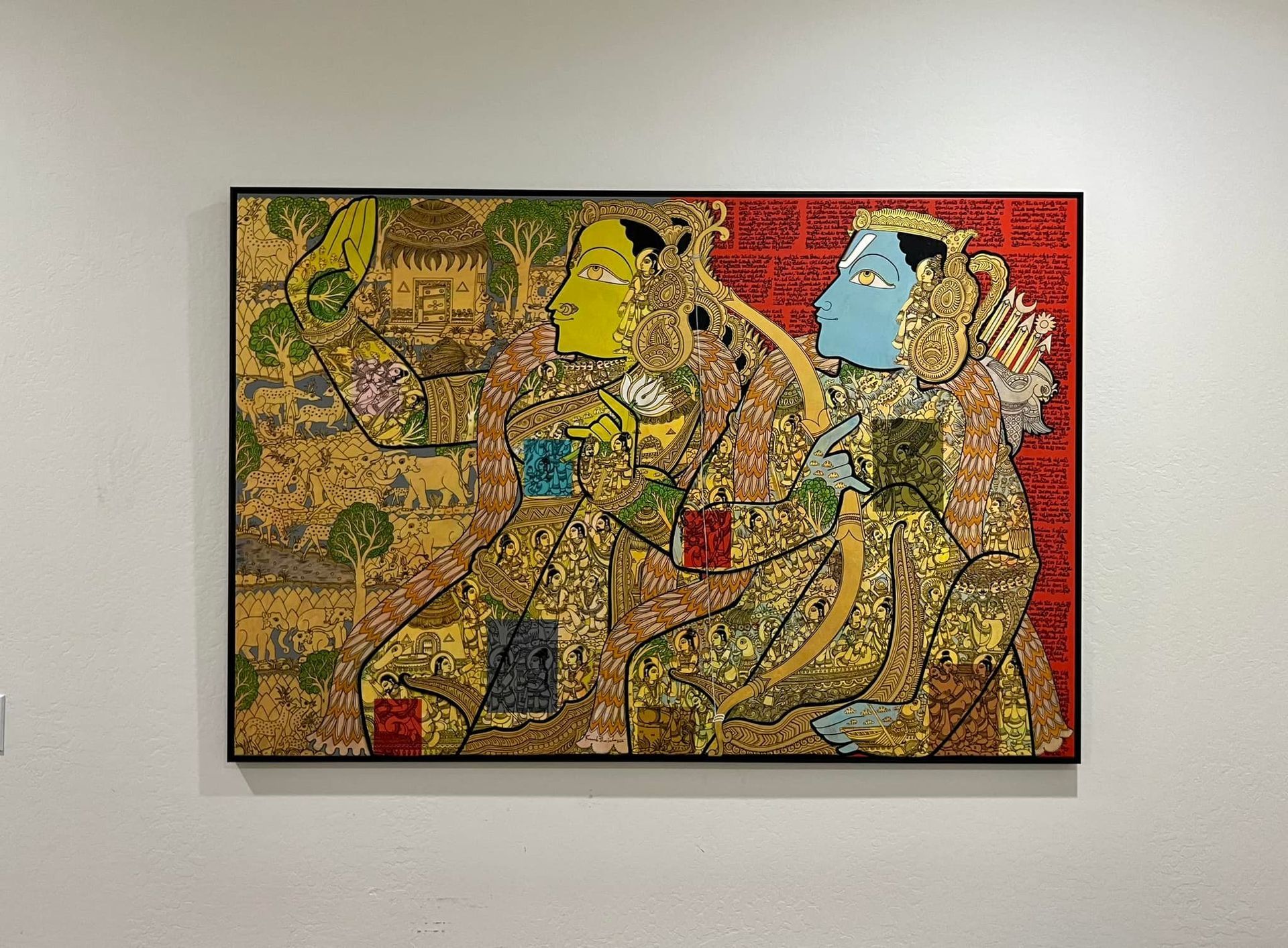 A white truck is parked in a parking lot next to a building.