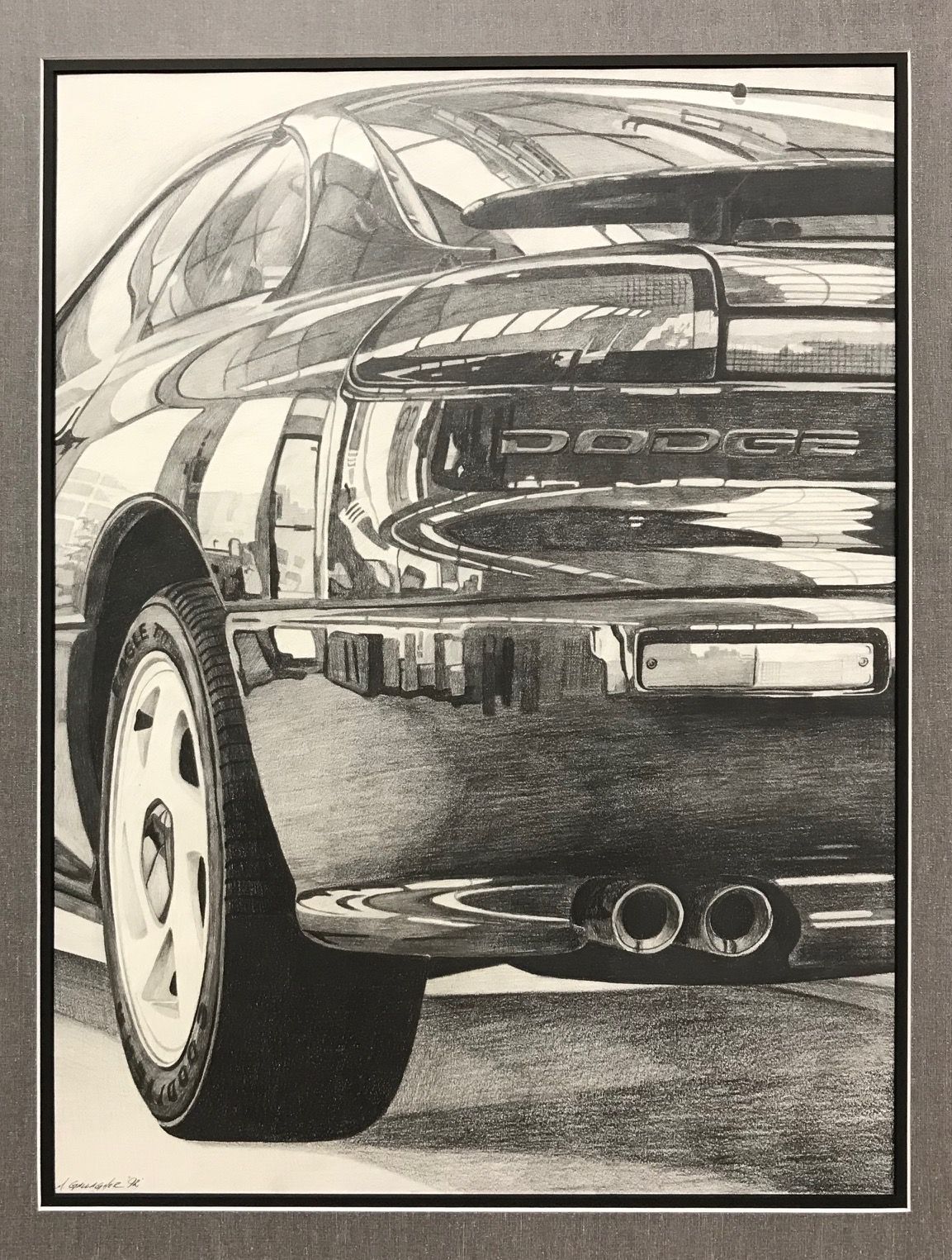 Pencil sketch of the rear of a black Dodge Stealth sports car, showing the bumper, exhaust, and tire.