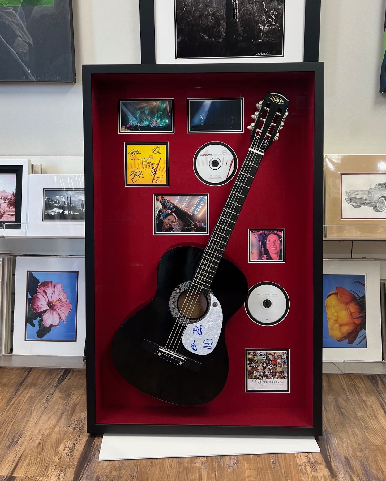 The inside of a moving truck filled with boxes and blankets.