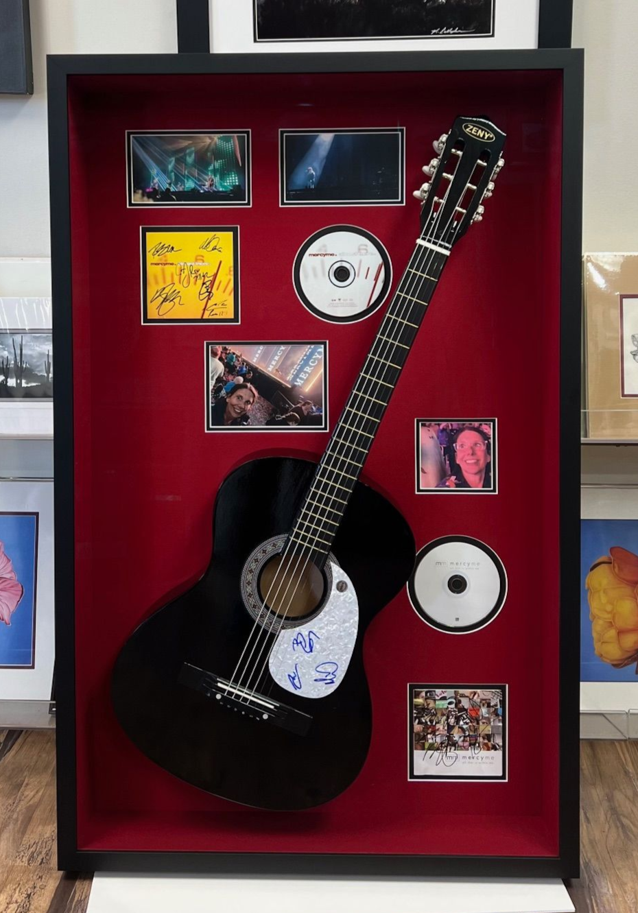 The inside of a moving truck filled with boxes and blankets.
