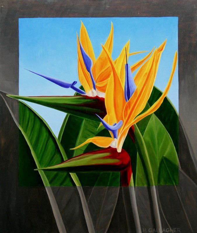 A white truck is parked in a parking lot next to a building.