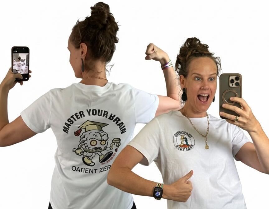 Bay is wearing her Patient Zero Certember t-shirt after passing her PSPO1 with her thumbs up.