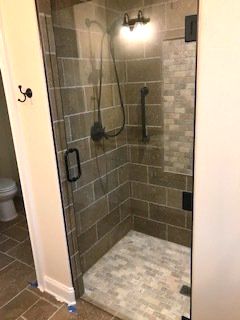 Shower Enclosure With Brown Tiles — Knoxville, TN — Glass Pros Knoxville