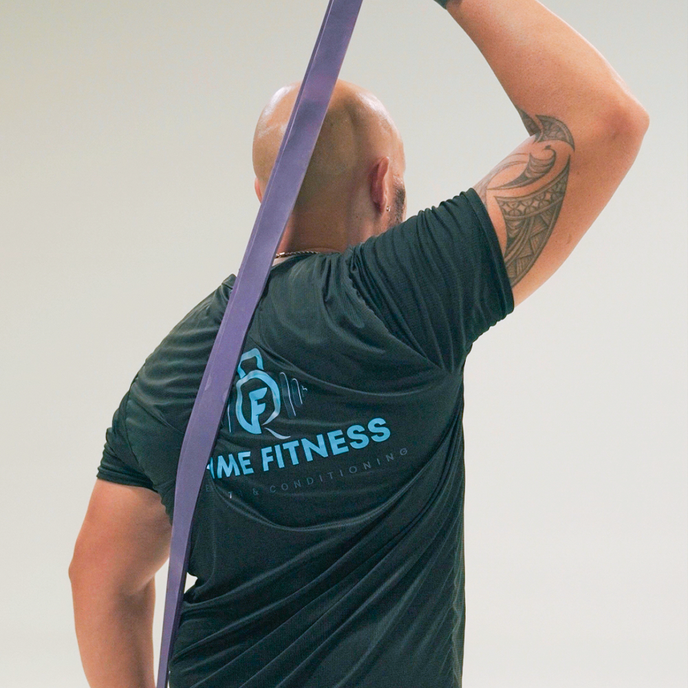 Quintin Wakefield wearing a black shirt that says me fitness