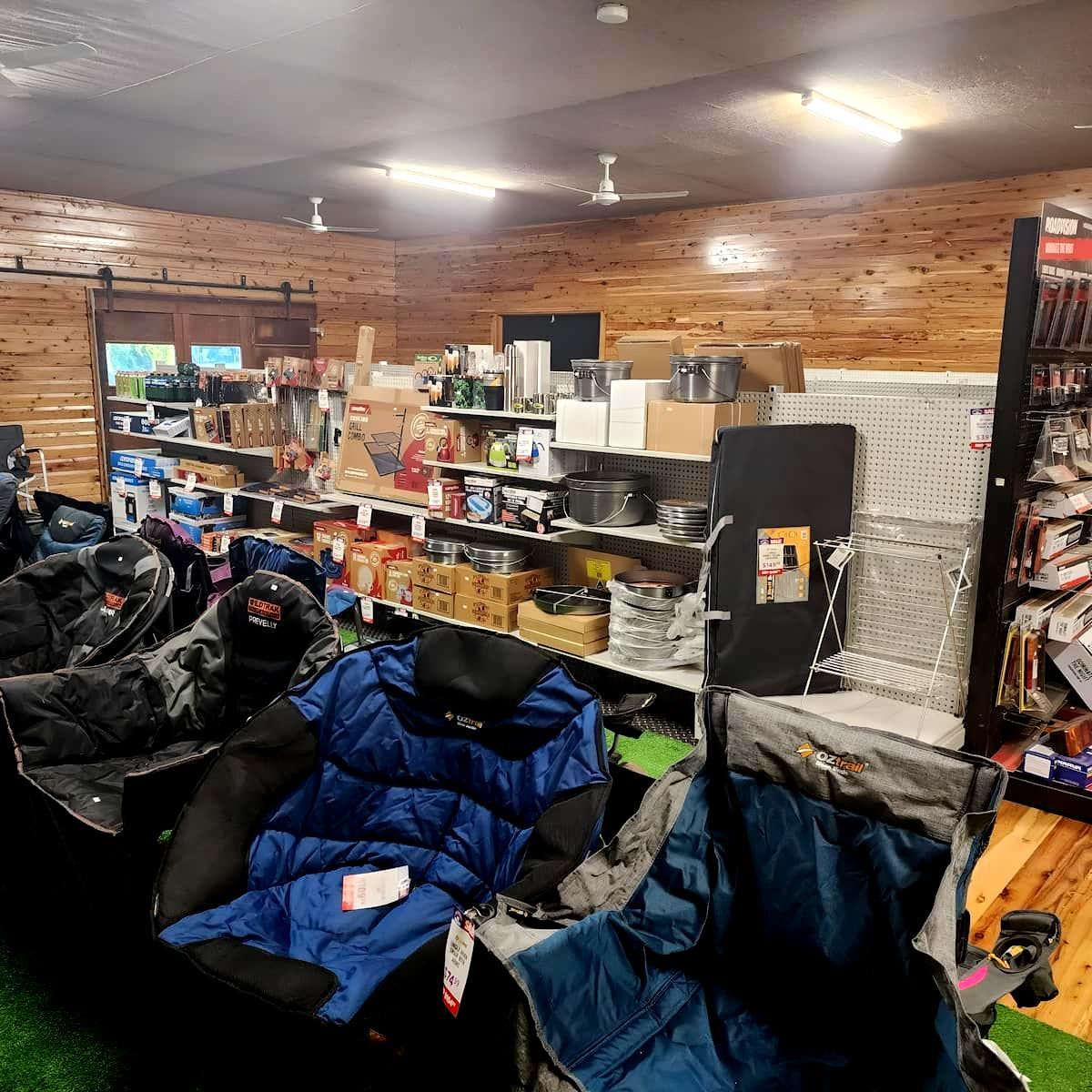 A Store Filled With Lots Of Sleeping Bags And Chairs — Murgon Auto Parts & Outdoors In Murgon, QLD