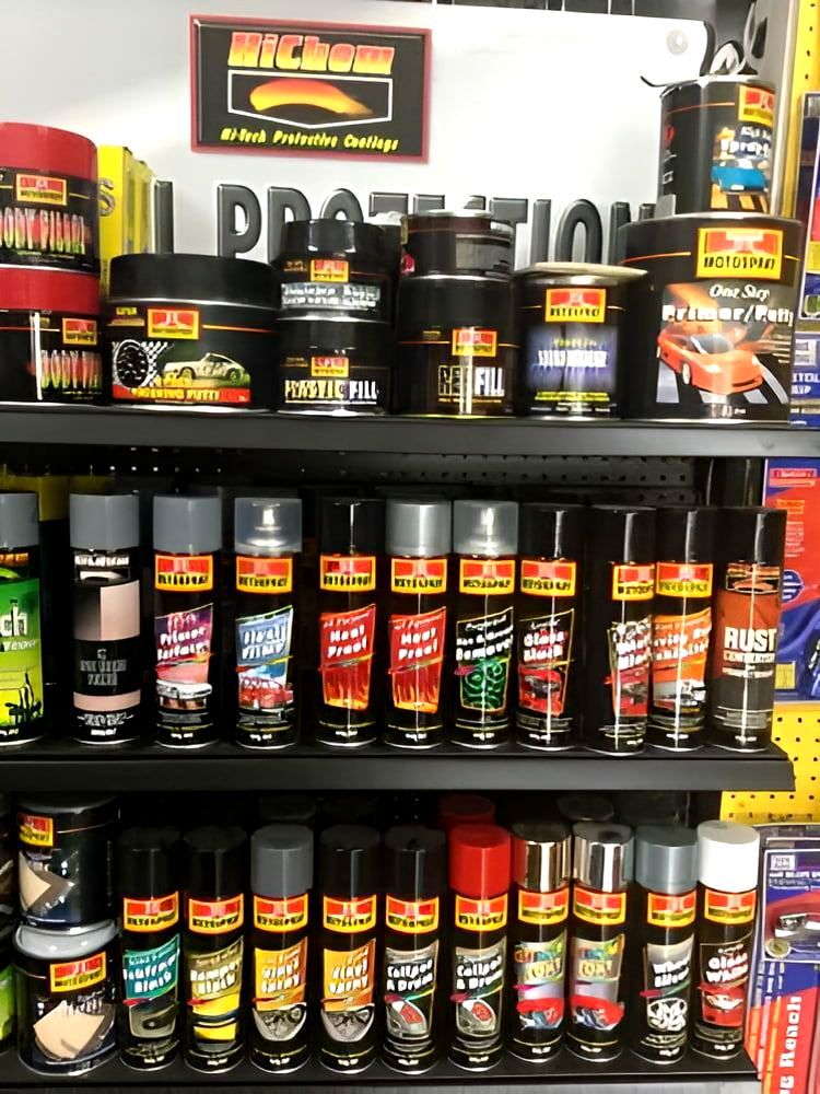 A Store Shelf Filled With a Variety of Spray Paints — Murgon Auto Parts & Outdoors in Murgon, QLD