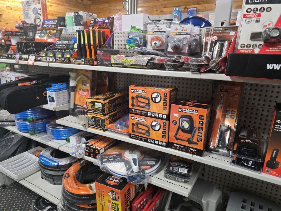 A Store Shelf Filled With a Variety of Tools and Supplies — Murgon Auto Parts & Outdoors in Murgon, QLD