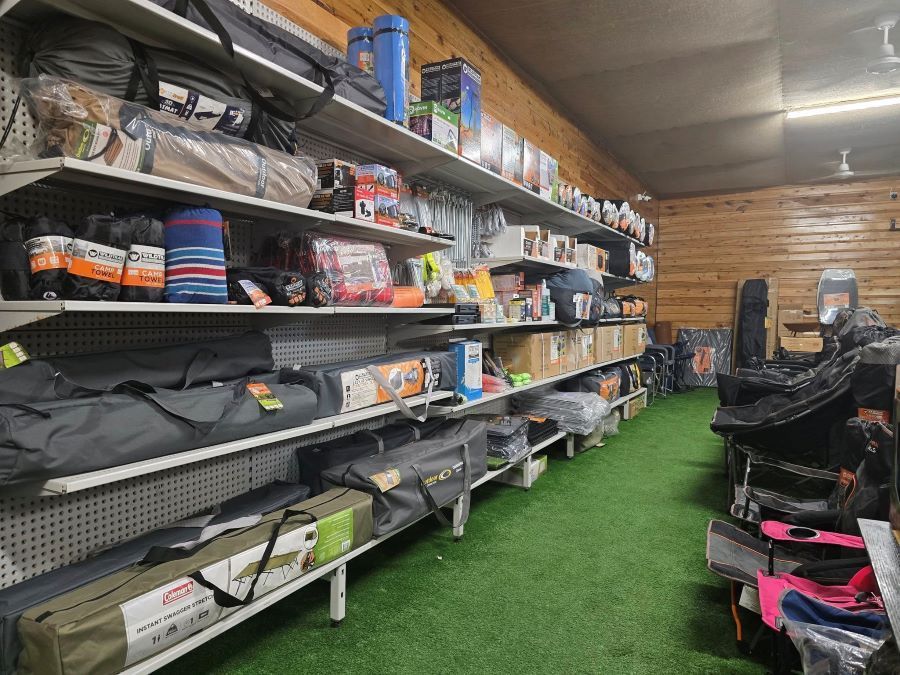 A Store Filled With Lots of Shelves and Bags — Murgon Auto Parts & Outdoors in Murgon, QLD
