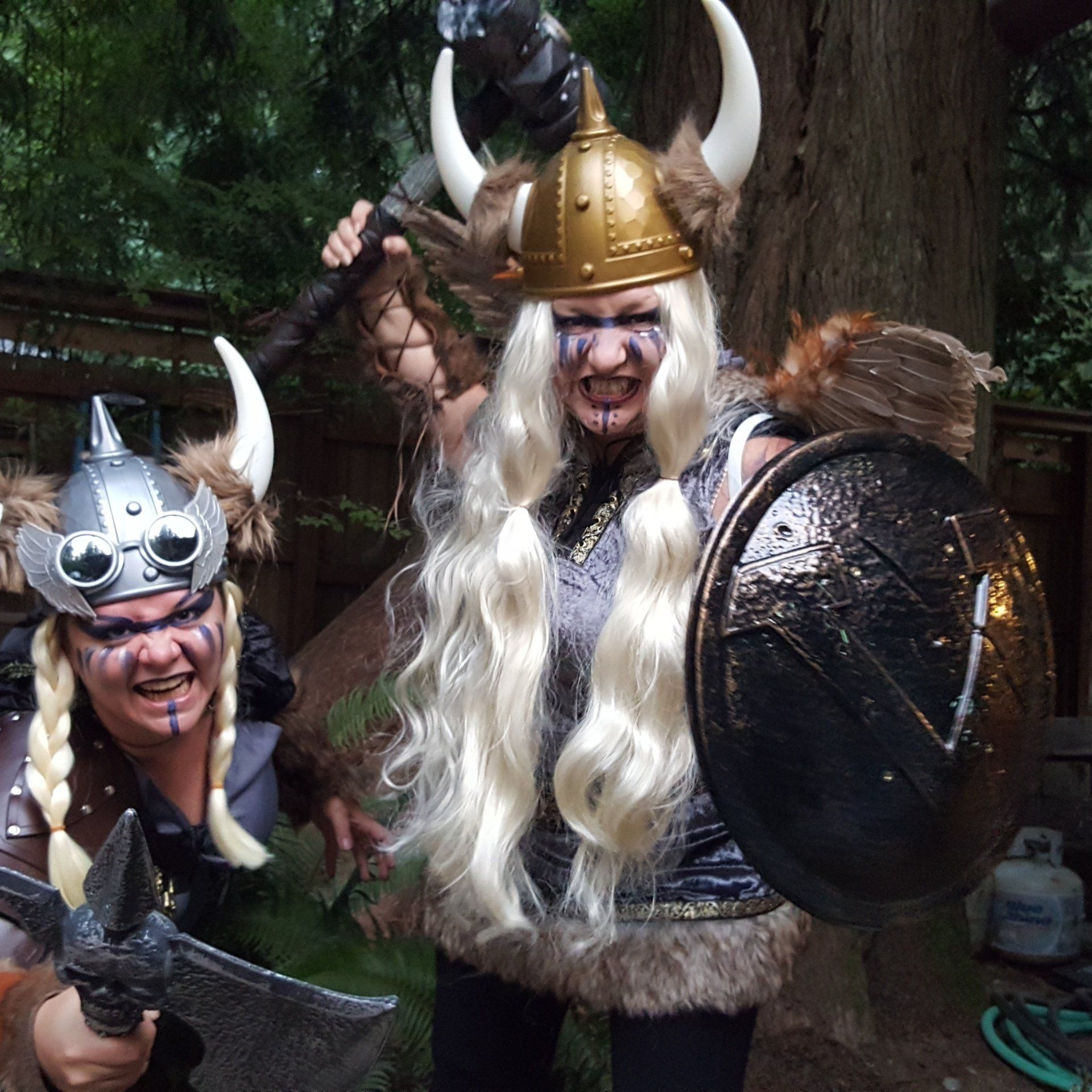 A man and a woman dressed as vikings are posing for a picture, Belladonna LaVeau.