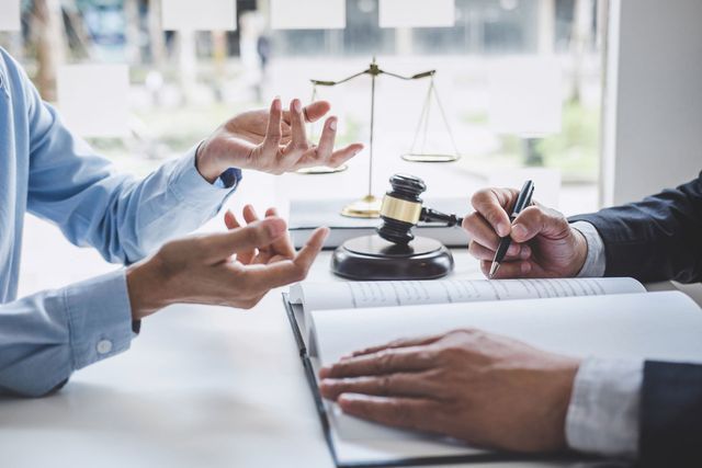 Client Explaining to Lawyer — Livonia, MI — Charles J Schneider PC