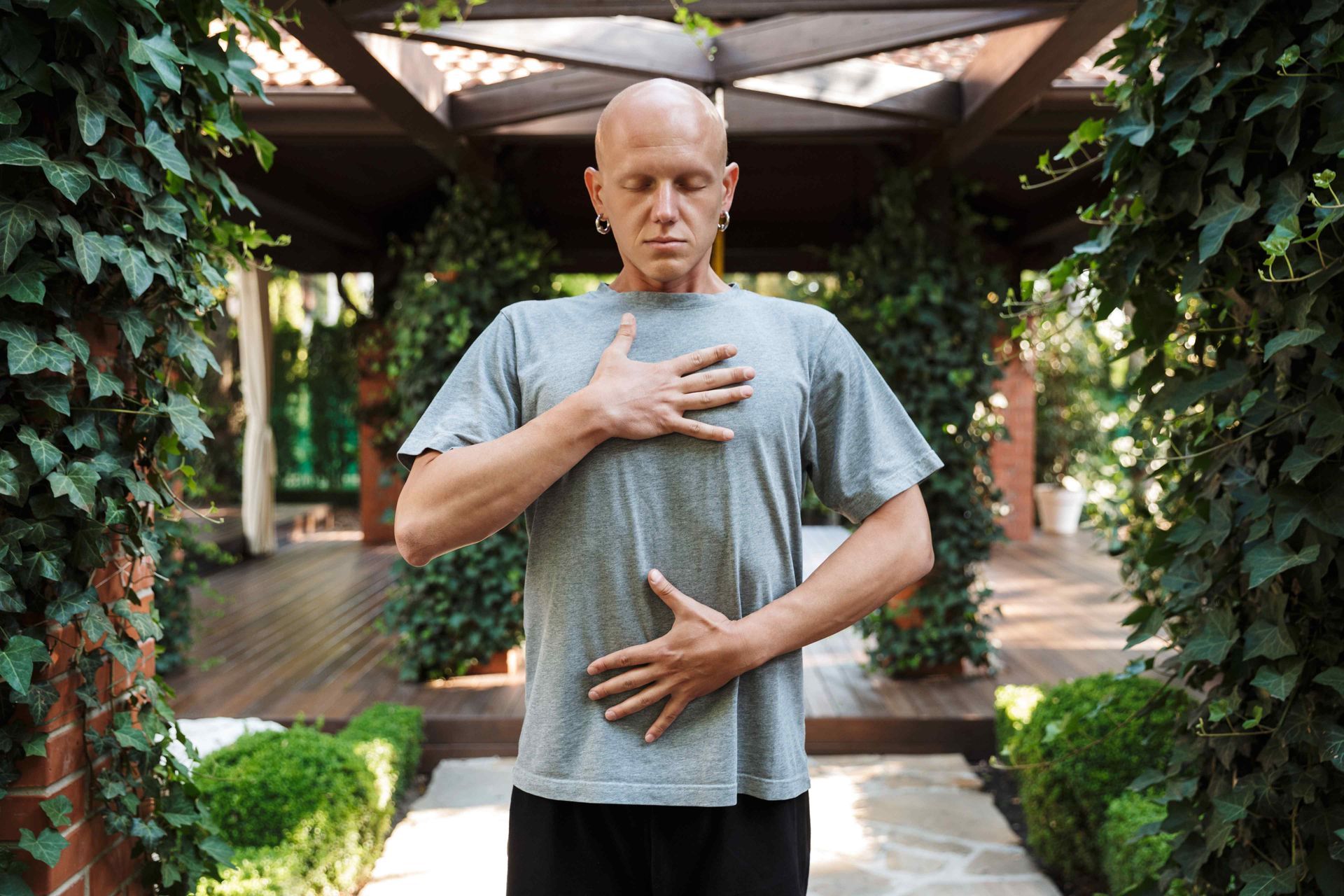 Man performing Grief Yoga© breathing exercises 