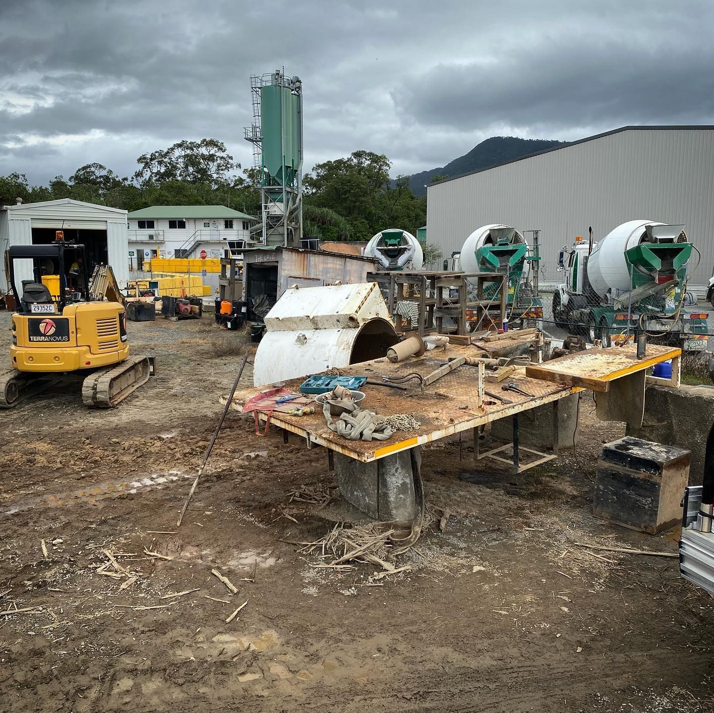 Construction Site With Excavator, Concrete Mixers — Terranovus Earthworks & Plant Hire in Cairns City, QLD
