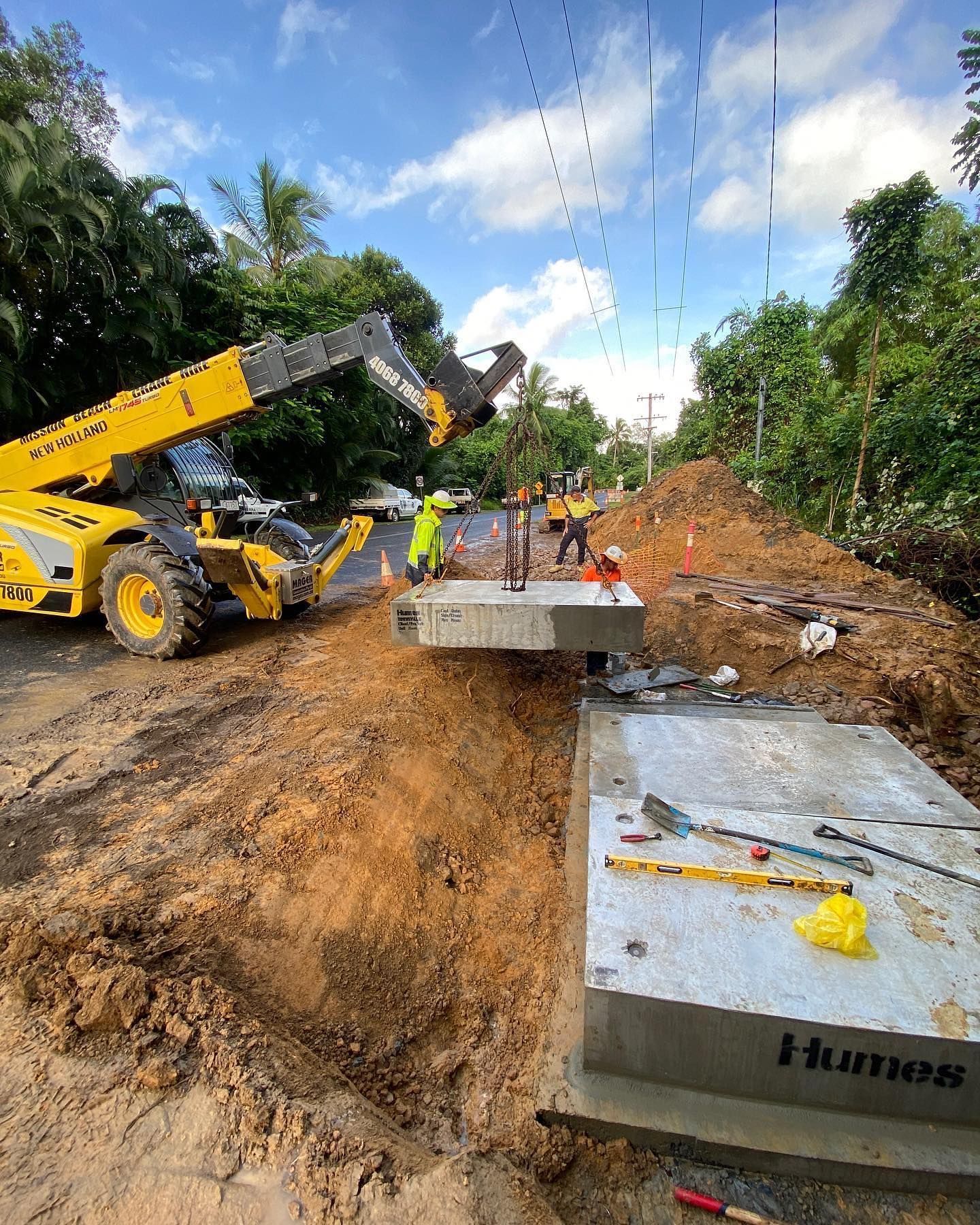 Construction Workers Installing a Concrete Structure — Terranovus Earthworks & Plant Hire in Cairns City, QLD