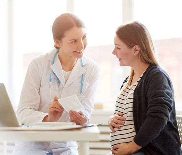 Pregnant Woman at Doctors Office — Benton County Health Department — Warsaw, MO