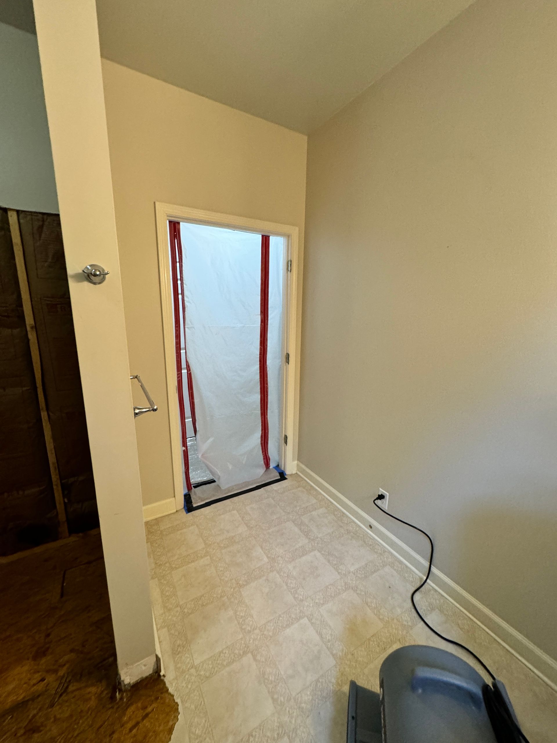 A kitchen with wooden cabinets , granite counter tops , and hardwood floors.