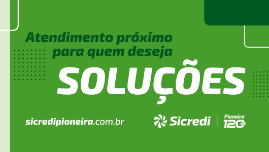 A green sign that says atendimento proximo para quem deseja solucoes