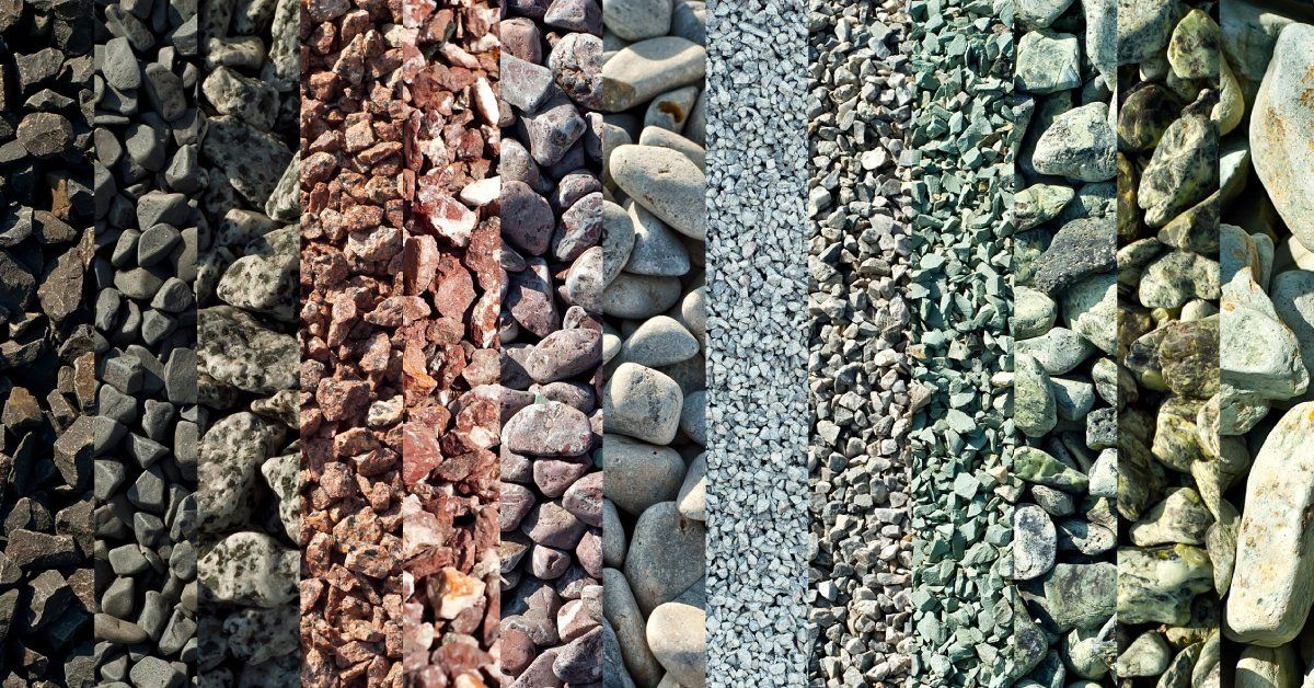 Thirteen types of drainage aggregate in different colors and materials, sitting side by side.