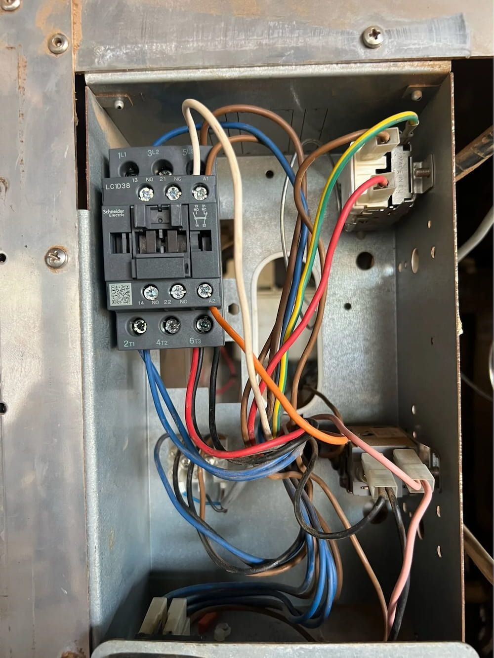 Metal Electrical Panel With Wires Connected to a Contactor — BNS Refrigeration Services in Healy, QLD