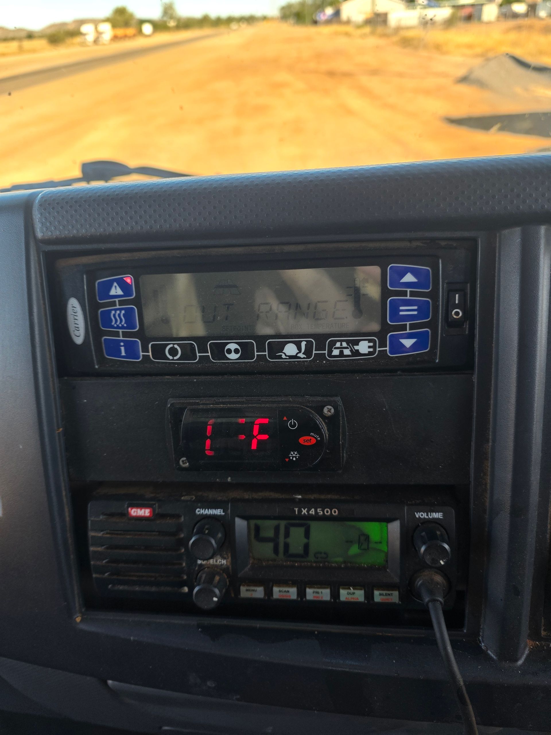 Dashboard With Radio and Temperature Display in a Vehicle — BNS Refrigeration Services in Healy, QLD