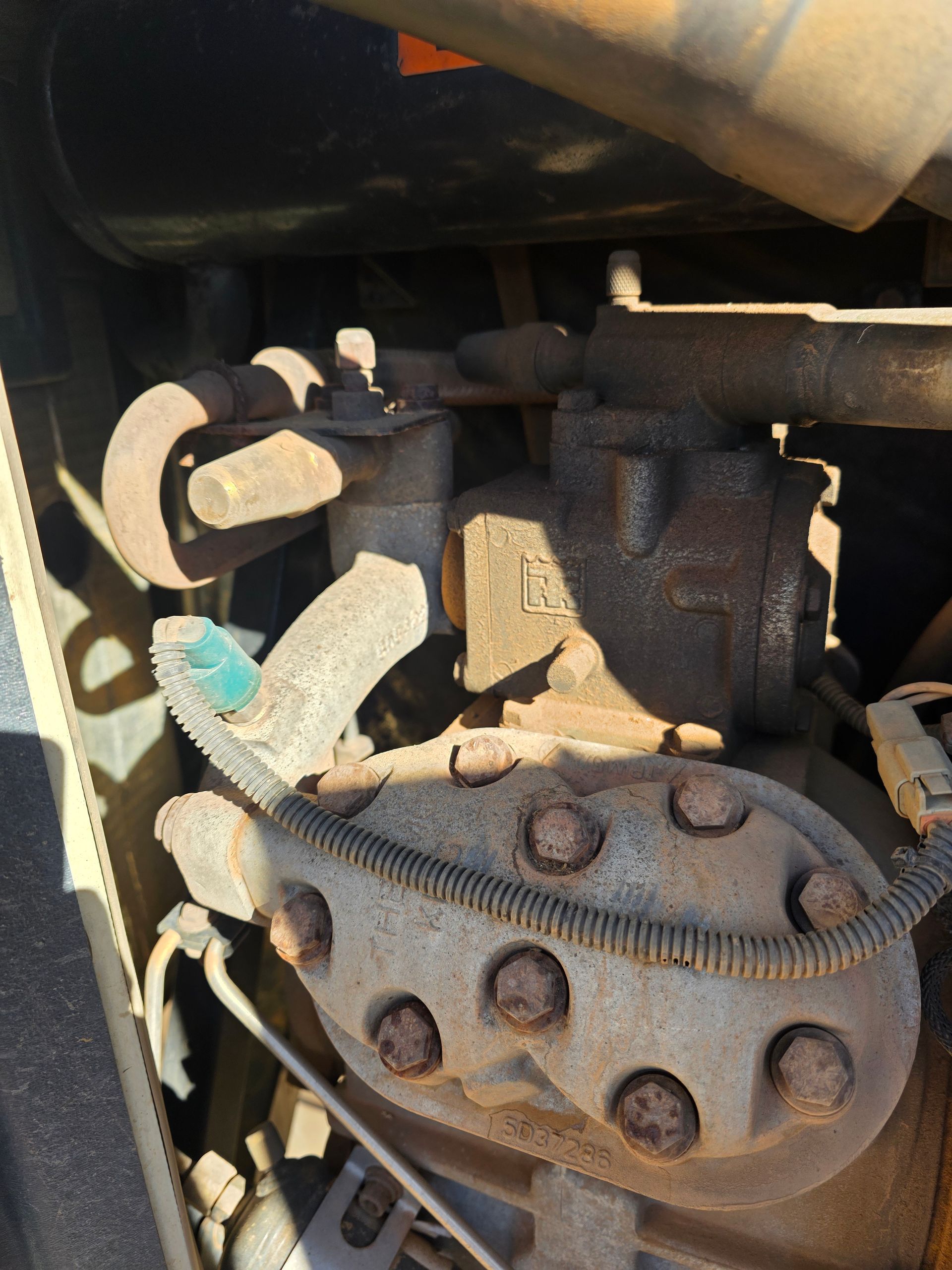 Close-up of a Vehicle's Air Conditioning Compressor — BNS Refrigeration Services in Healy, QLD
