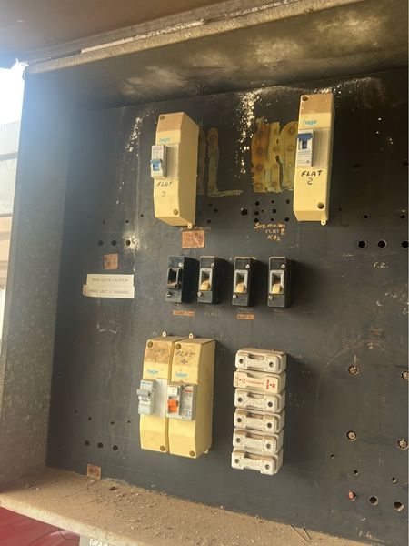 Electrical Panel With Various Circuit Breakers and Fuses — BNS Refrigeration Services in Healy, QLD