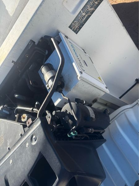 Machinery Under Vehicle Hood — BNS Refrigeration Services in Healy, QLD