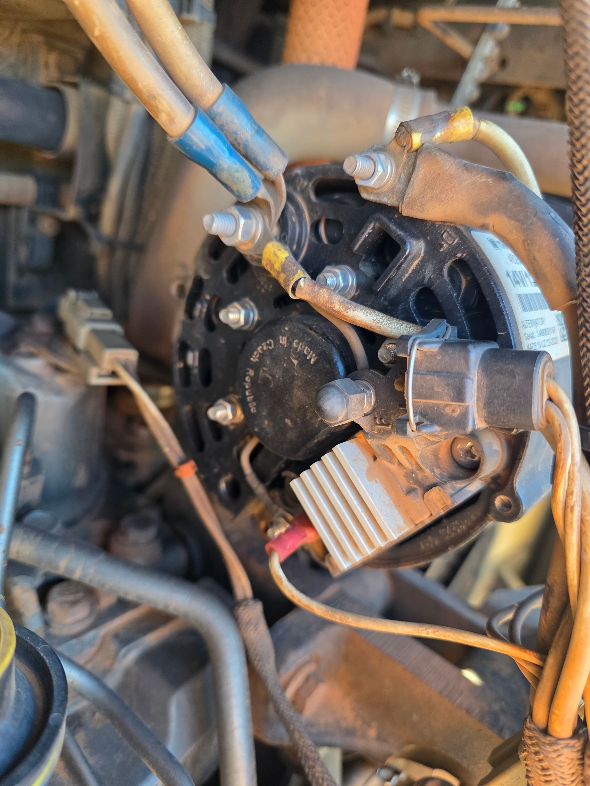 Black Alternator With Attached Wires and Connectors — BNS Refrigeration Services in Healy, QLD
