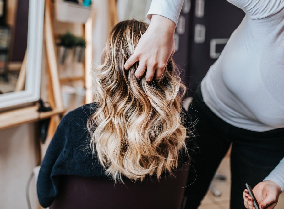Beautiful Hairstyle Of A Woman After Dyeing Hair And Making Highlights In Hair Salon — Sophisticut Hair Salon in Mysterton, QLD