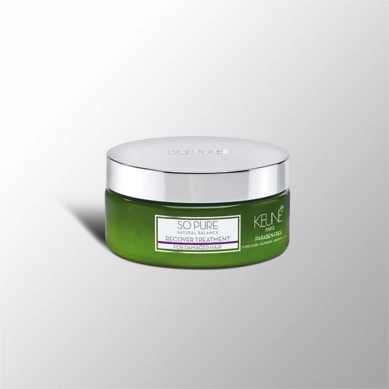 A jar of Keune So Pure hair treatment with a green body and silver lid, set against a white background. — Sophisticut Hair Salon in Mysterton, QLD