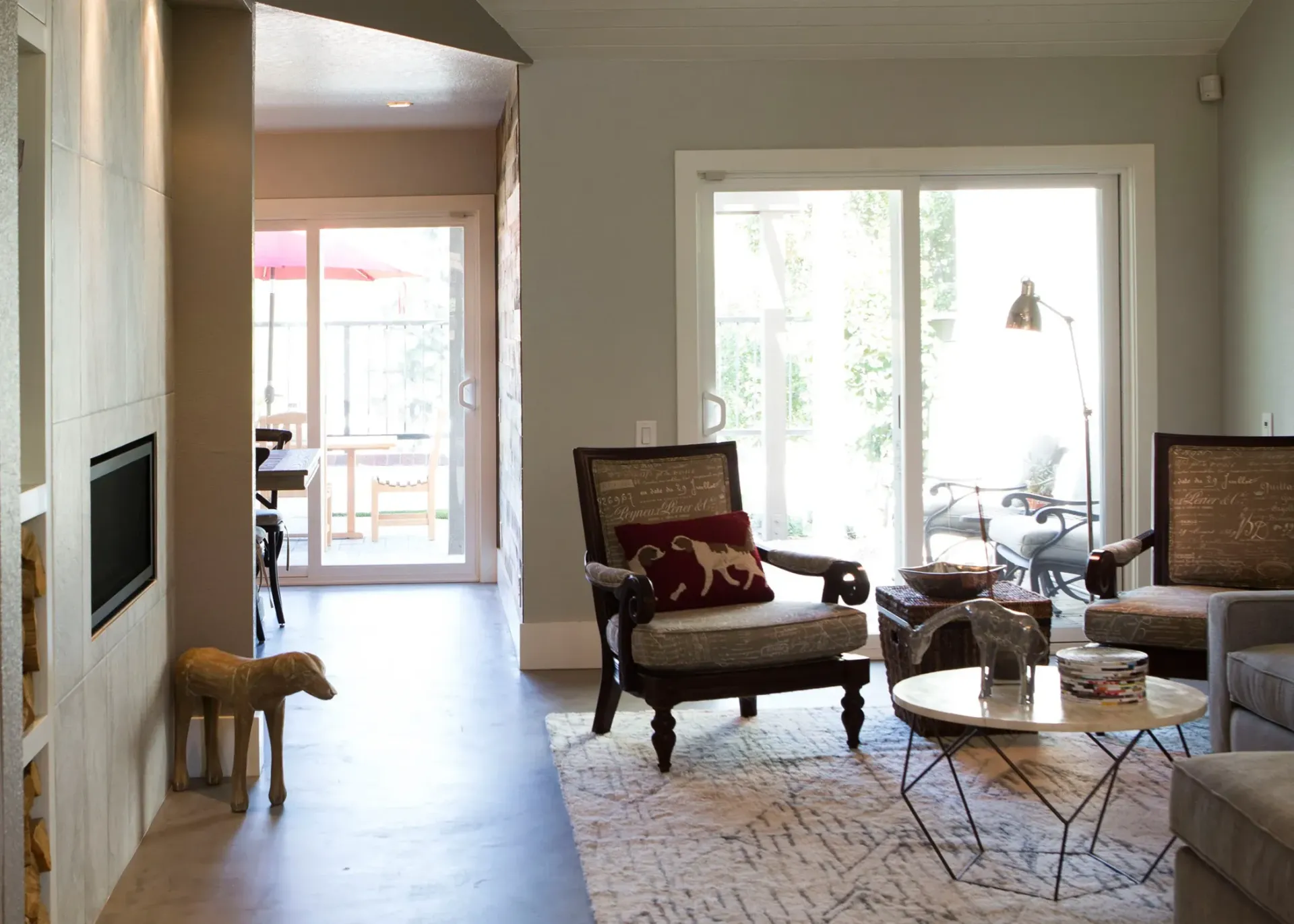 A living room with two chairs and a coffee table