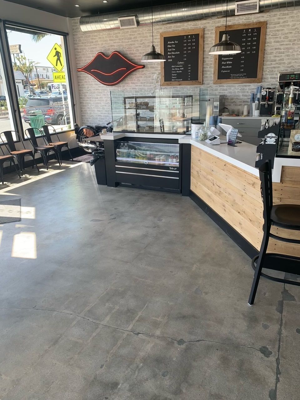 The inside of a restaurant with a sign that says ' snf ' on it