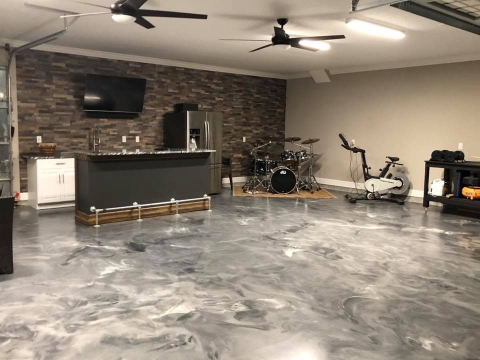 There is a drum set in the middle of the room.